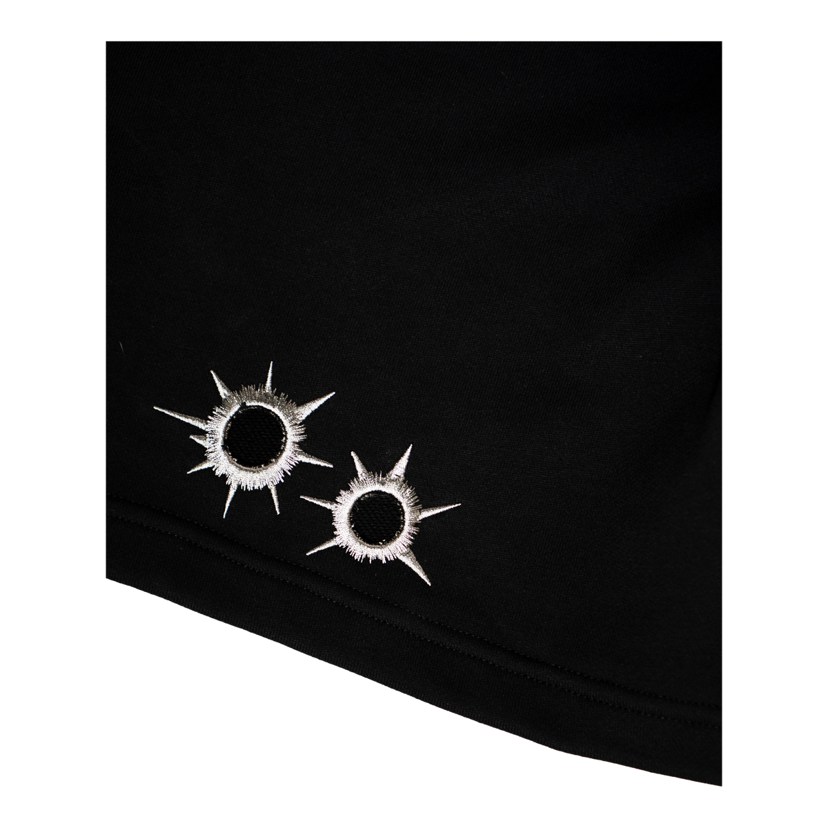 5Loop Danger Zone tracky shorts, close-up of embroidered distressed details near the hem